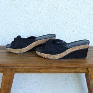Donald J. Pliner black slip on wedges with cork